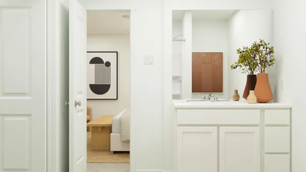 a bathroom with a sink and a mirror