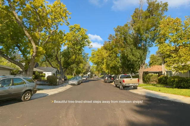 a view of street with sitting area