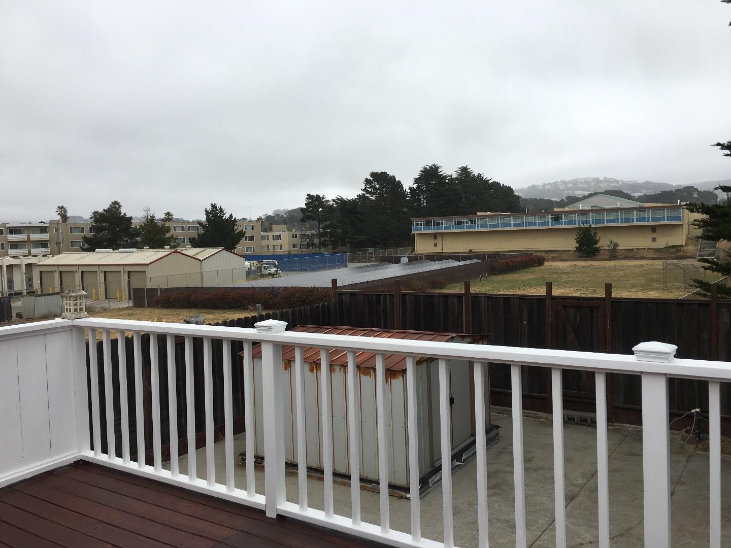 808 Ellis Drive Daly City, CA 94015 - Photo 45 of 45 a view of a balcony with wooden floor and city view