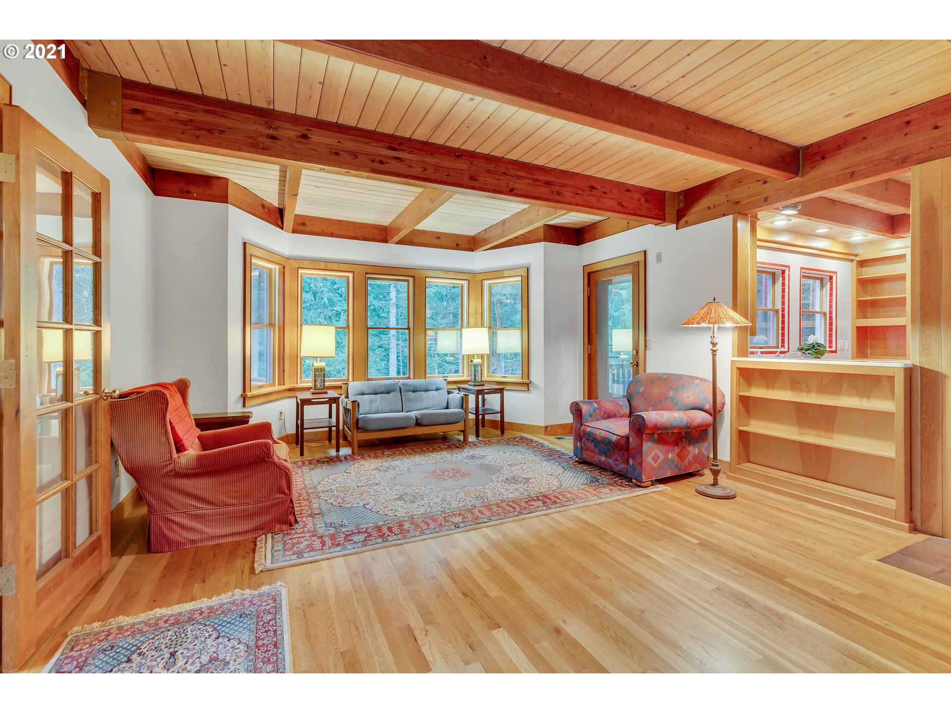 53236 East Marmot Road Sandy, OR 97055 - Photo 5 of 32 a room with furniture and a large window