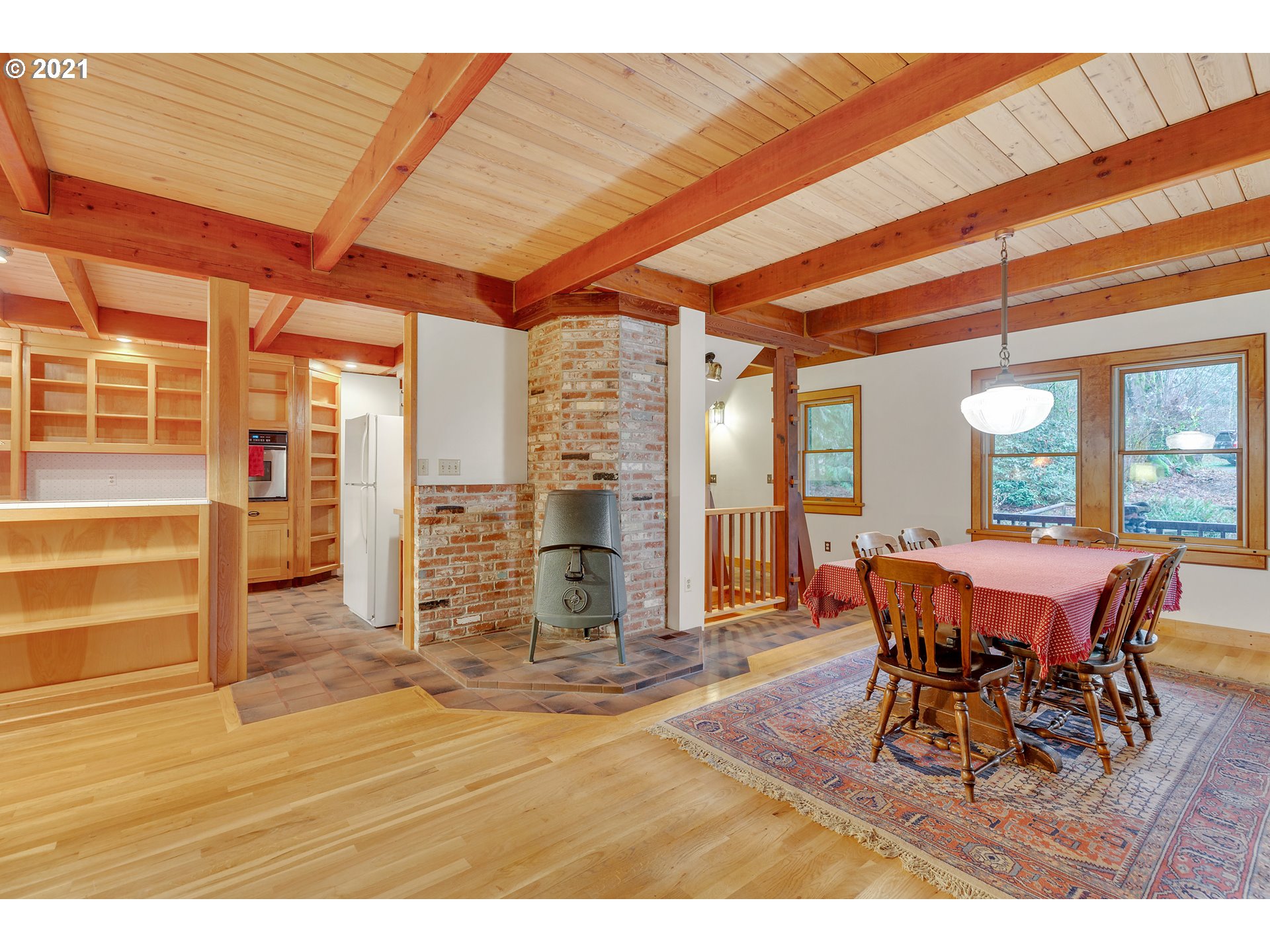 53236 East Marmot Road Sandy, OR 97055 - Photo 6 of 32 a dining room with furniture and wooden floor