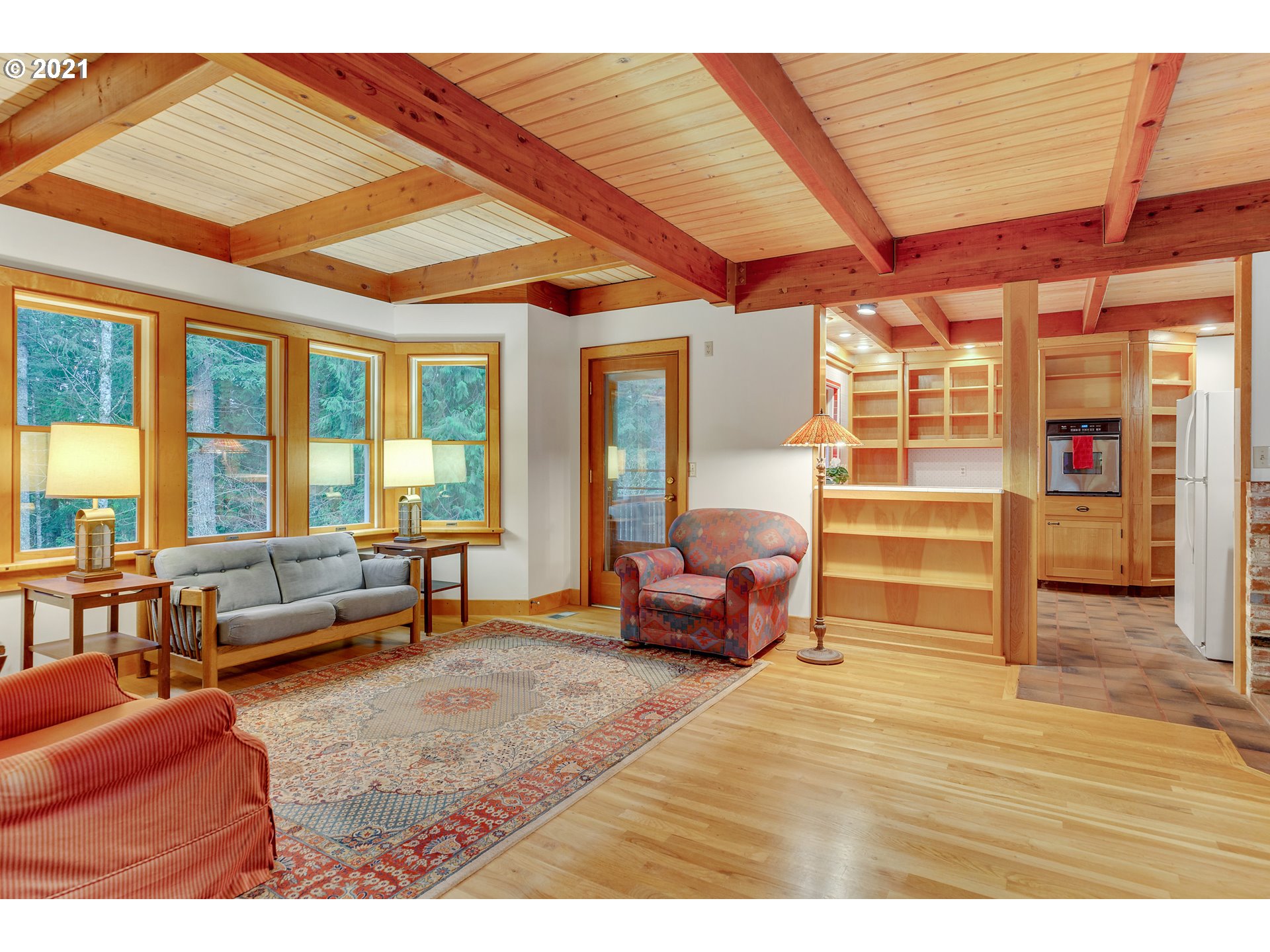 53236 East Marmot Road Sandy, OR 97055 - Photo 7 of 32 a living room with furniture and a large window