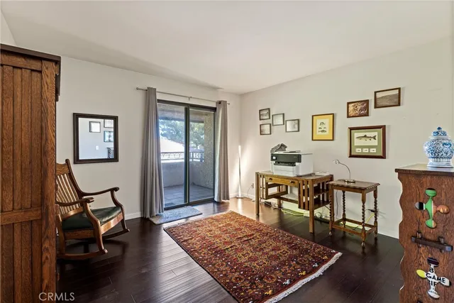a view of a livingroom with furniture and a couch