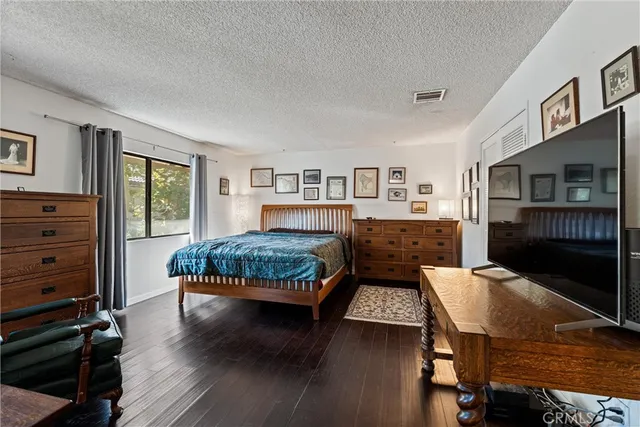 a bed room with furniture and a window