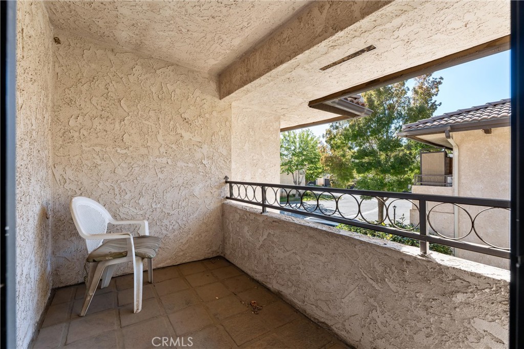 236 Hawk Lane Palmdale, CA 93551 - Photo 29 of 32 a view of a chair and table in the balcony