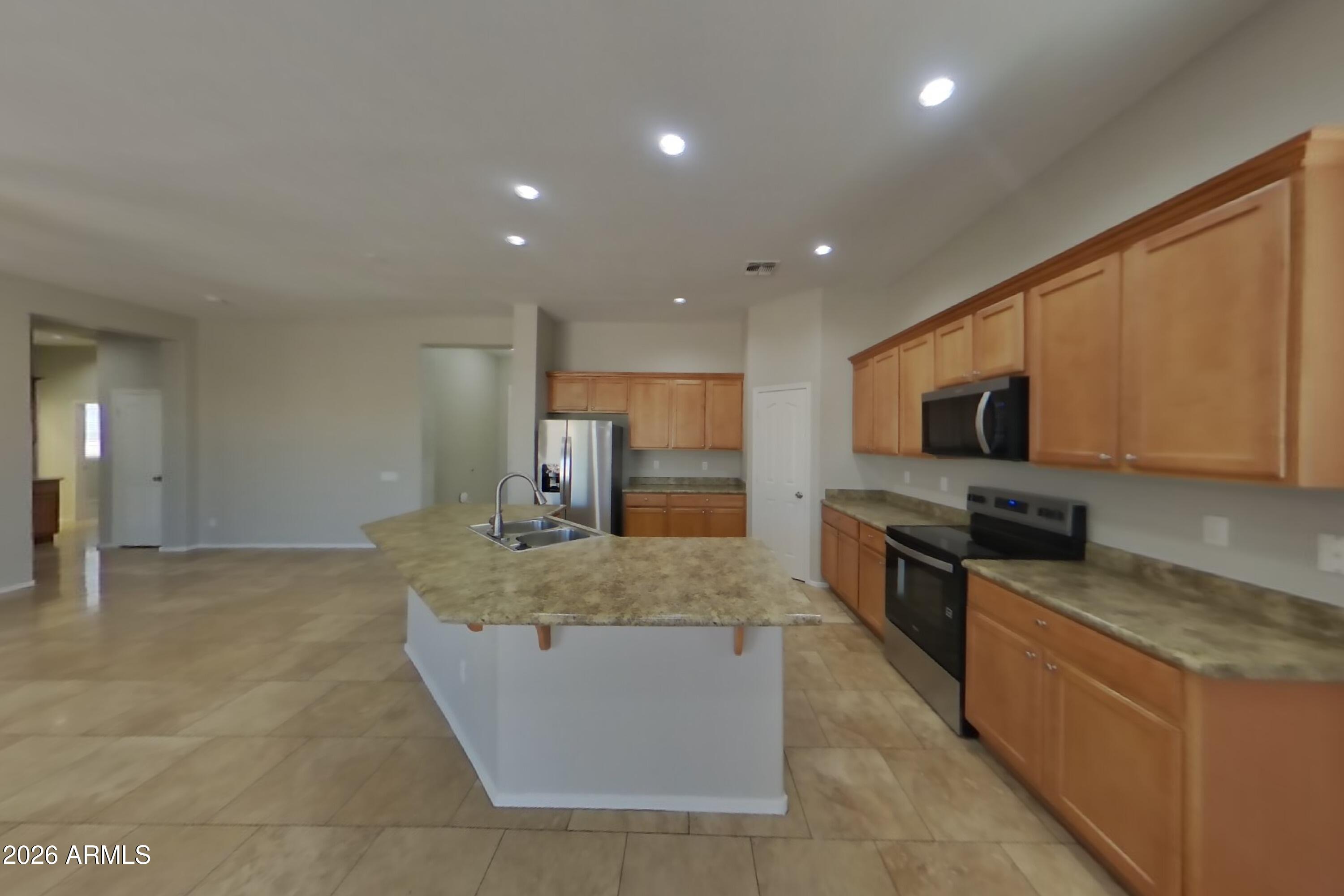 9310 West Rascon Loop Phoenix, AZ 85037 - Photo 6 of 16 5_Image_I2qKy1ISkb