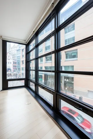 a view of empty room with windows