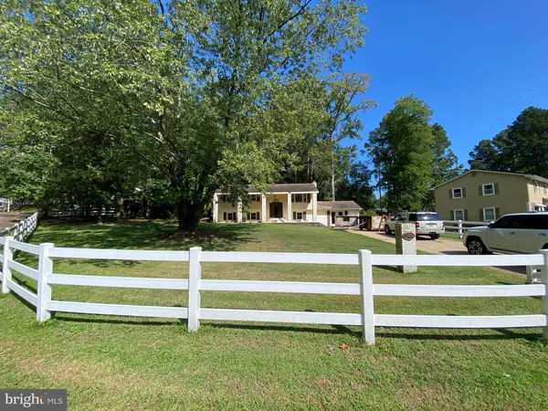 a view of backyard with deck