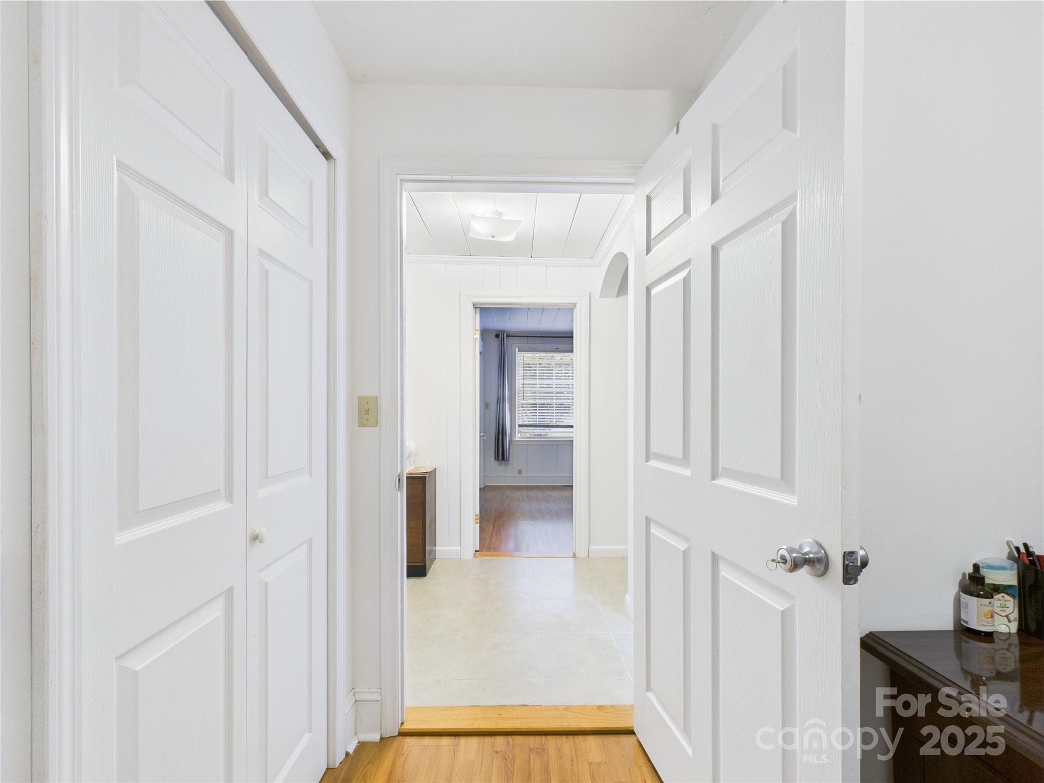 3055 16th Street Northeast Hickory, NC 28601 - Photo 15 of 46 a view of a hallway with wooden floor and staircase