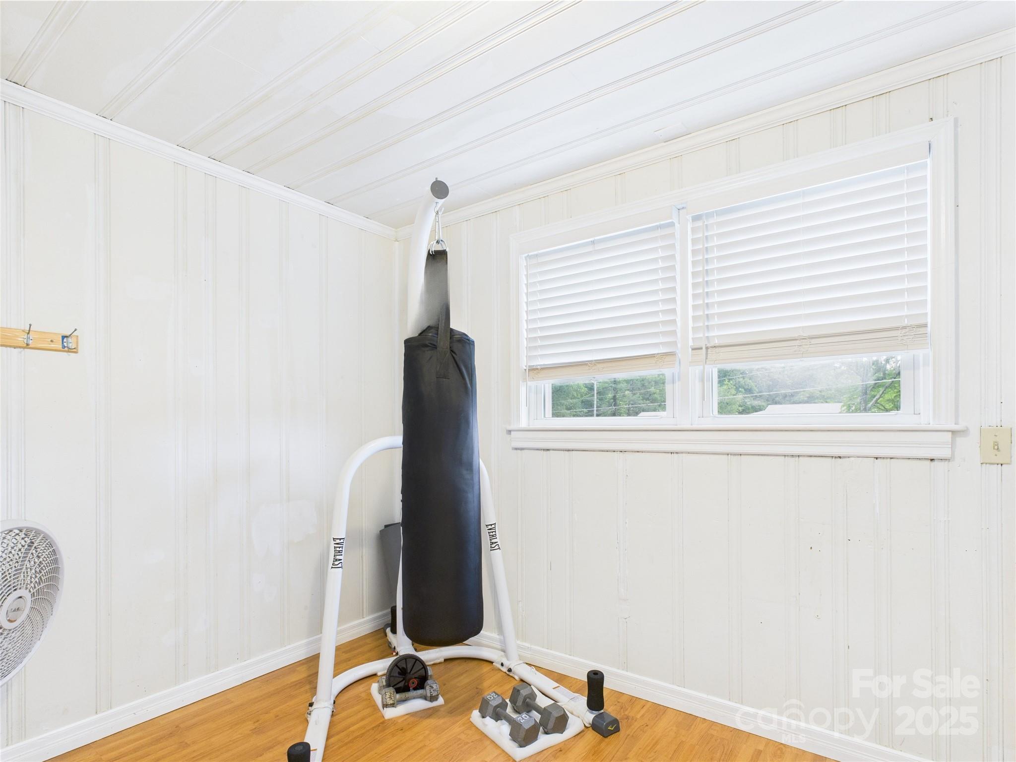 3055 16th Street Northeast Hickory, NC 28601 - Photo 17 of 46 a view of a room with a window and wooden floor