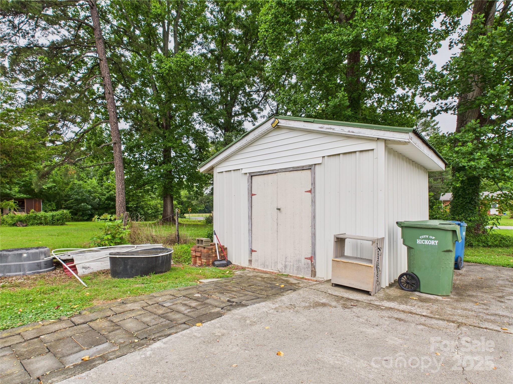 3055 16th Street Northeast Hickory, NC 28601 - Photo 35 of 46 a front view of a house with garden