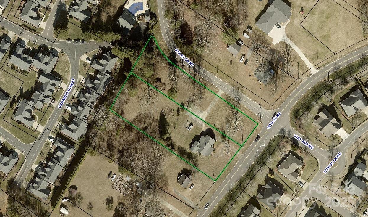 3055 16th Street Northeast Hickory, NC 28601 - Photo 45 of 46 an aerial view of a residential apartment building with a yard