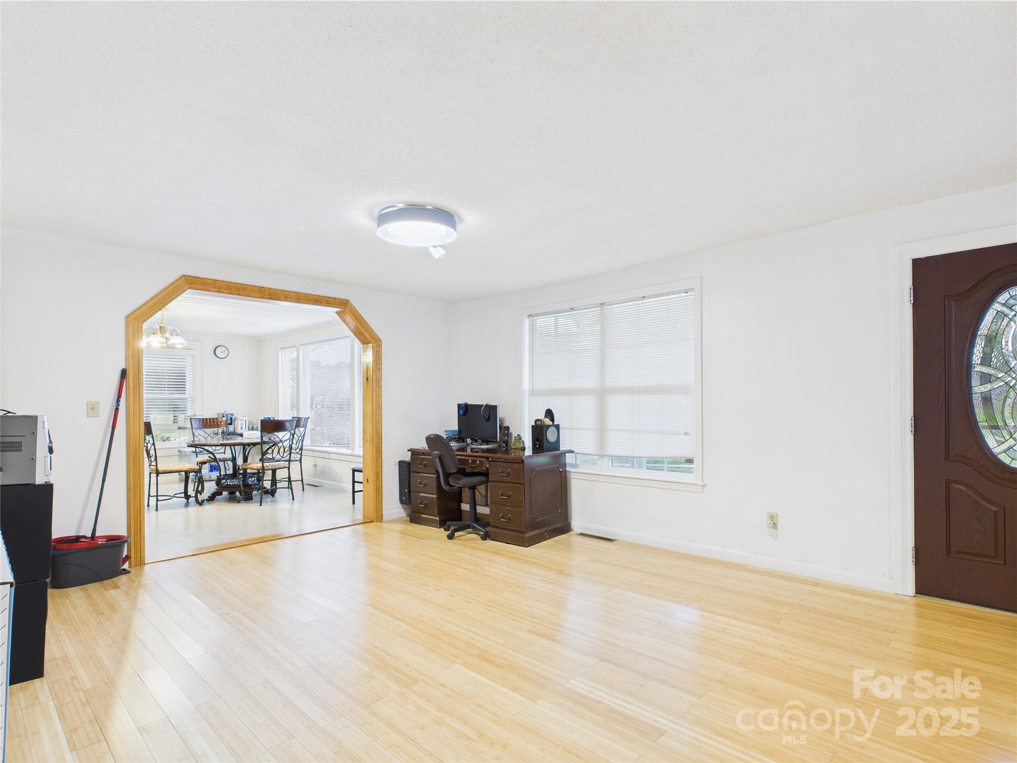3055 16th Street Northeast Hickory, NC 28601 - Photo 9 of 46 a view of workspace with wooden floor and furniture