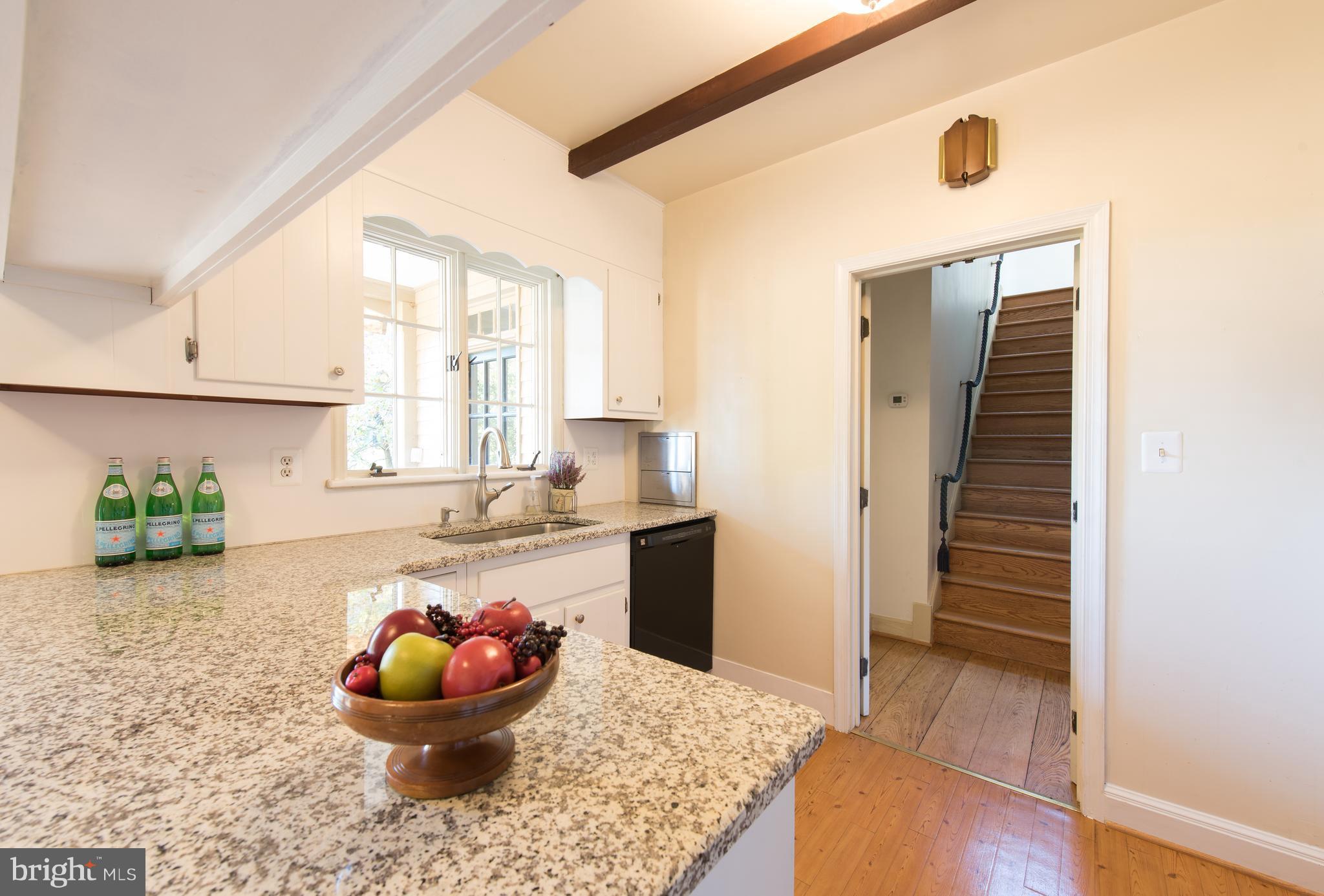 3645 Macalpine Road Ellicott City, MD 21042 - Photo 11 of 30 a room with wooden floor and a potted plant