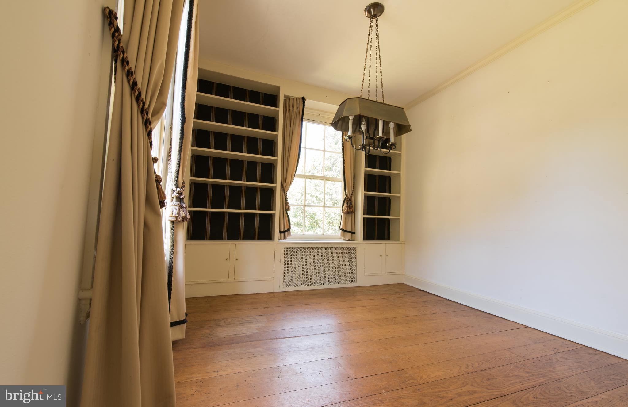 3645 Macalpine Road Ellicott City, MD 21042 - Photo 14 of 30 a view of empty room with windows and entryway