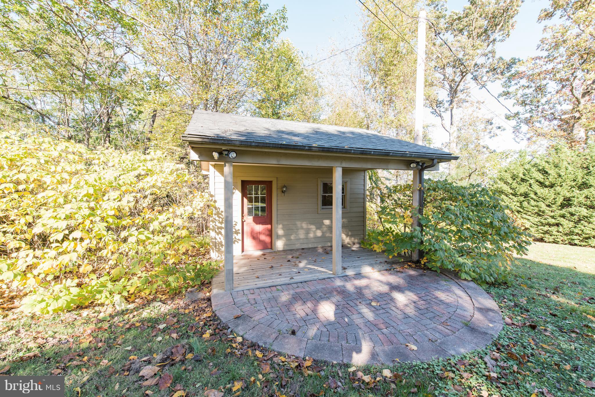 3645 Macalpine Road Ellicott City, MD 21042 - Photo 29 of 30 a view of a house with a yard