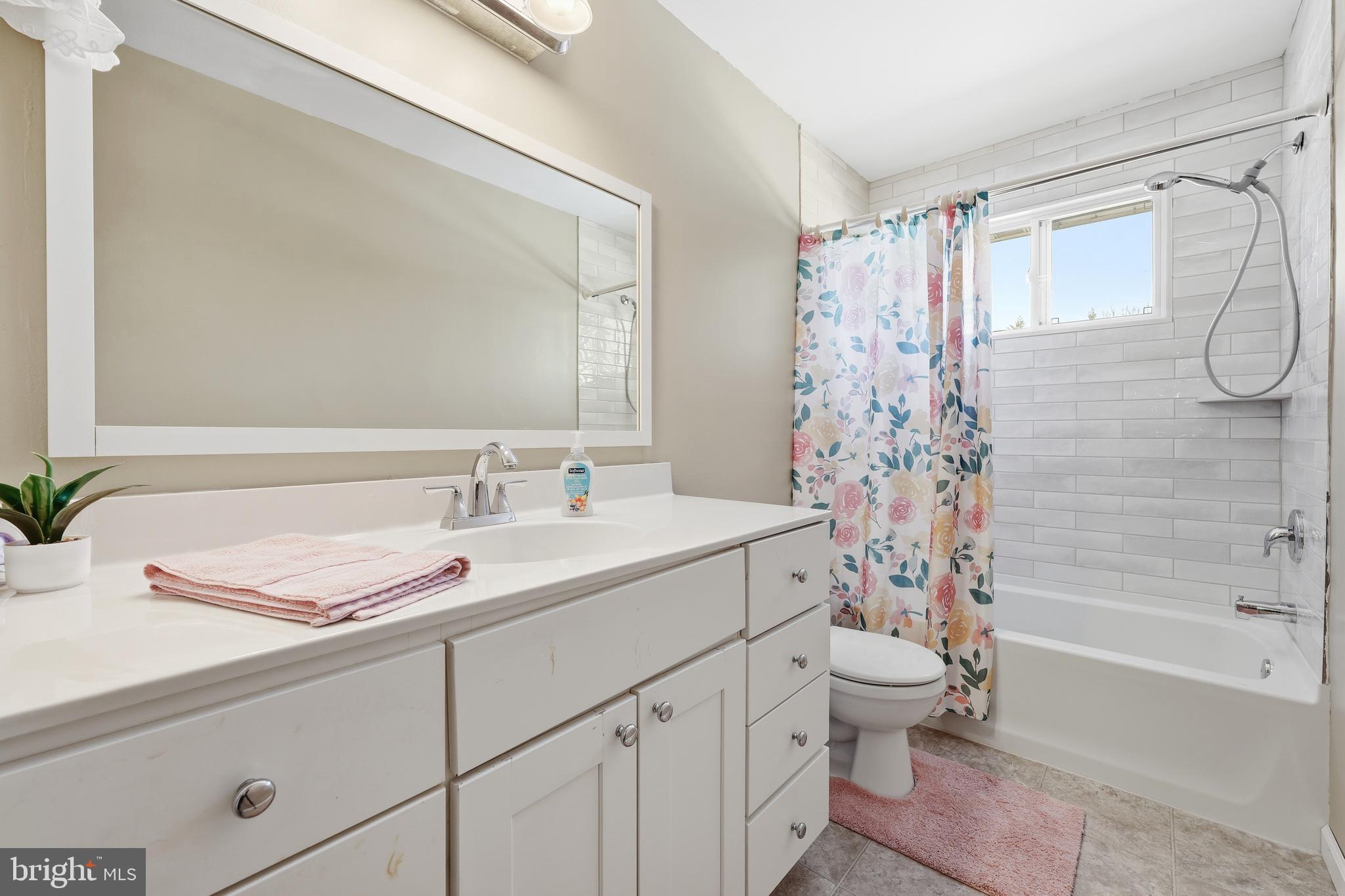 55 Plymouth Road Hammonton, NJ 08037 - Photo 22 of 45 a bathroom with a sink a toilet and a bathtub