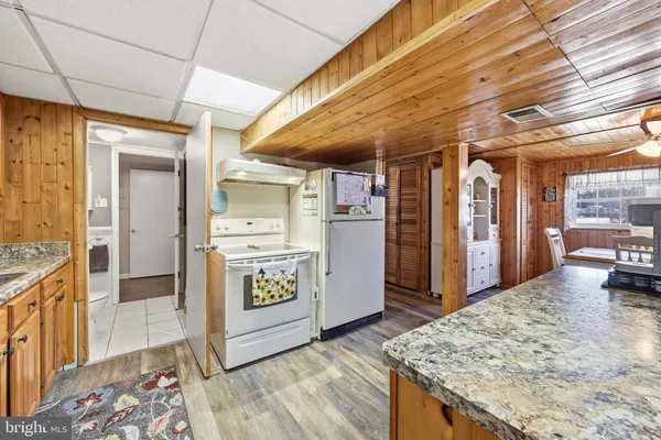 a view of a kitchen with a sink