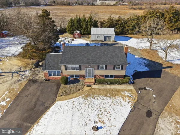a view of a house with swimming pool