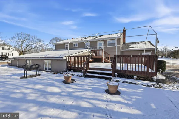 a view of a terrace with sitting area