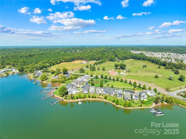 a view of a lake with a big yard