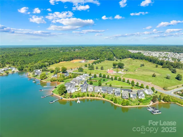 a view of a lake with a big yard