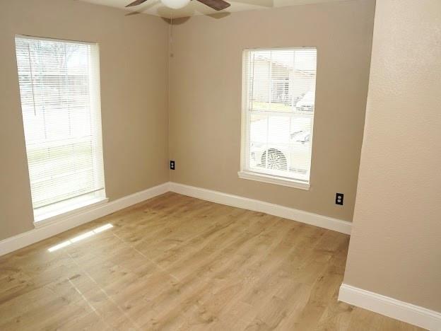515 Taylor Street Arlington, TX 76011 - Photo 11 of 18 an empty room with windows