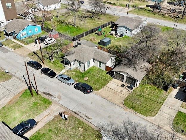 515 Taylor Street Arlington, TX 76011 - Photo 6 of 18 an aerial view of a house with a yard and a large tree