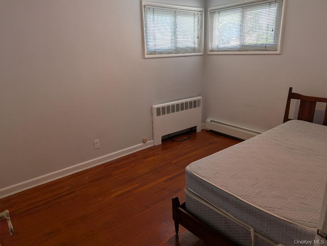 483 South Oyster Bay Road Plainview, NY 11803 - Photo 6 of 9 a room with bunk bed