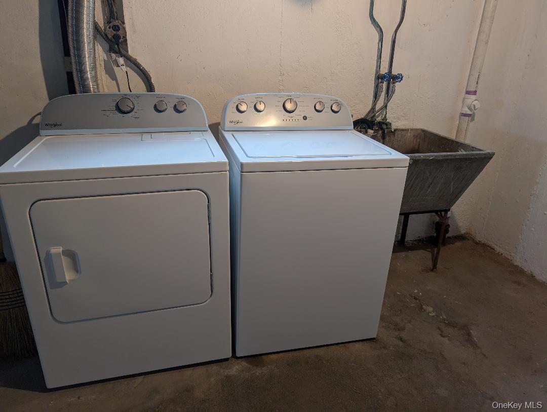 483 South Oyster Bay Road Plainview, NY 11803 - Photo 9 of 9 a utility room with dryer and washer