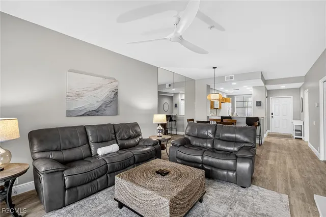 a living room with furniture and a couch