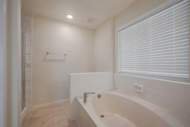 a bathroom with a bathtub