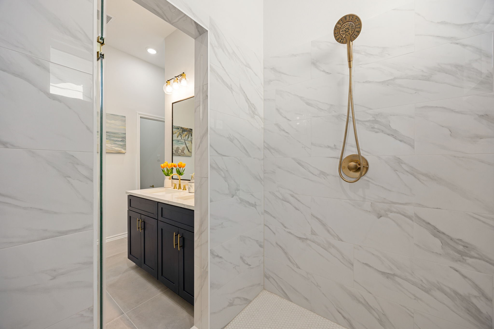 2720 Spence Street Houston, TX 77093 - Photo 26 of 50 a bathroom with a sink and a shower