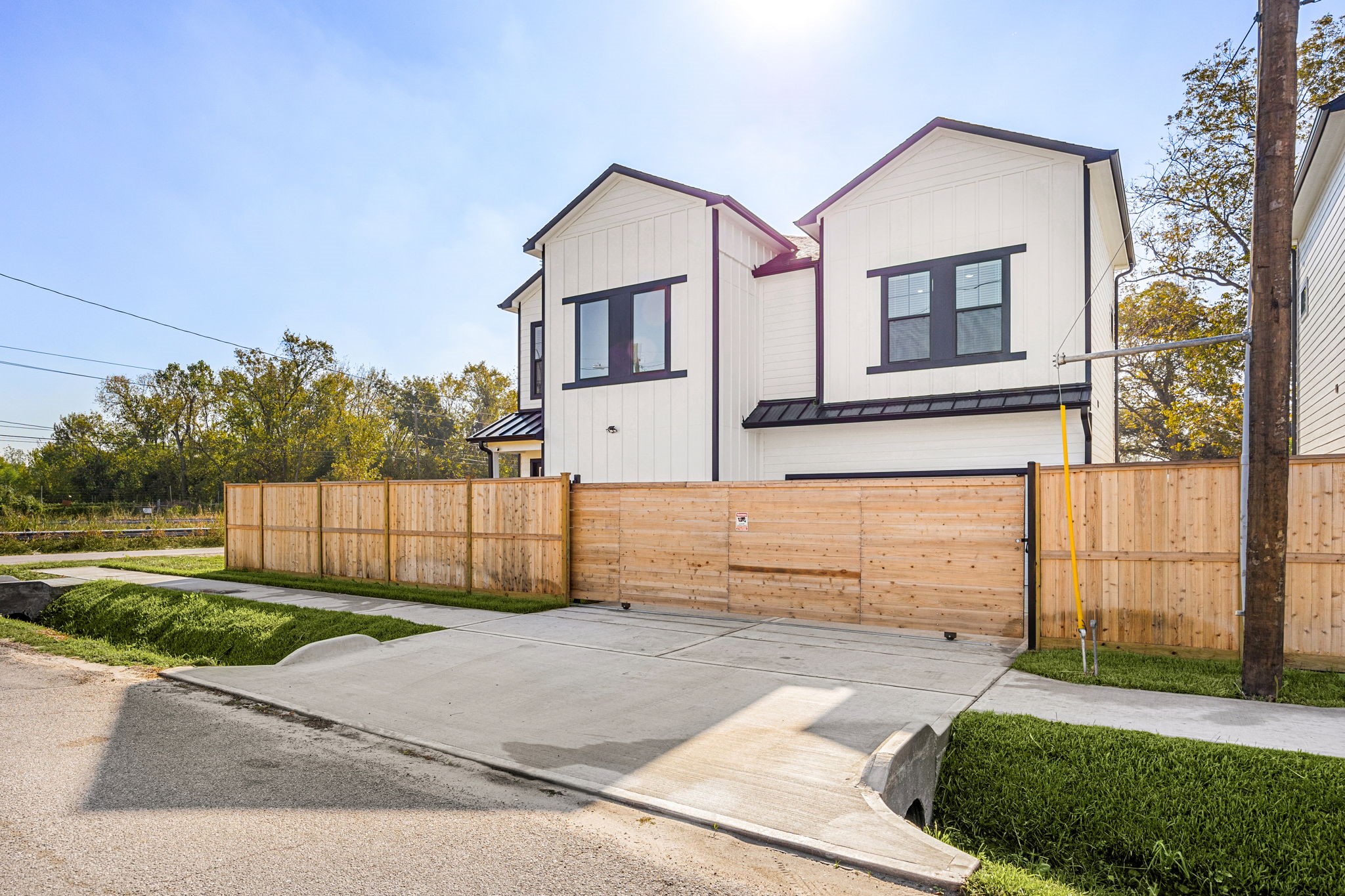 2720 Spence Street Houston, TX 77093 - Photo 3 of 50 a view of a white house with a small yard and large window