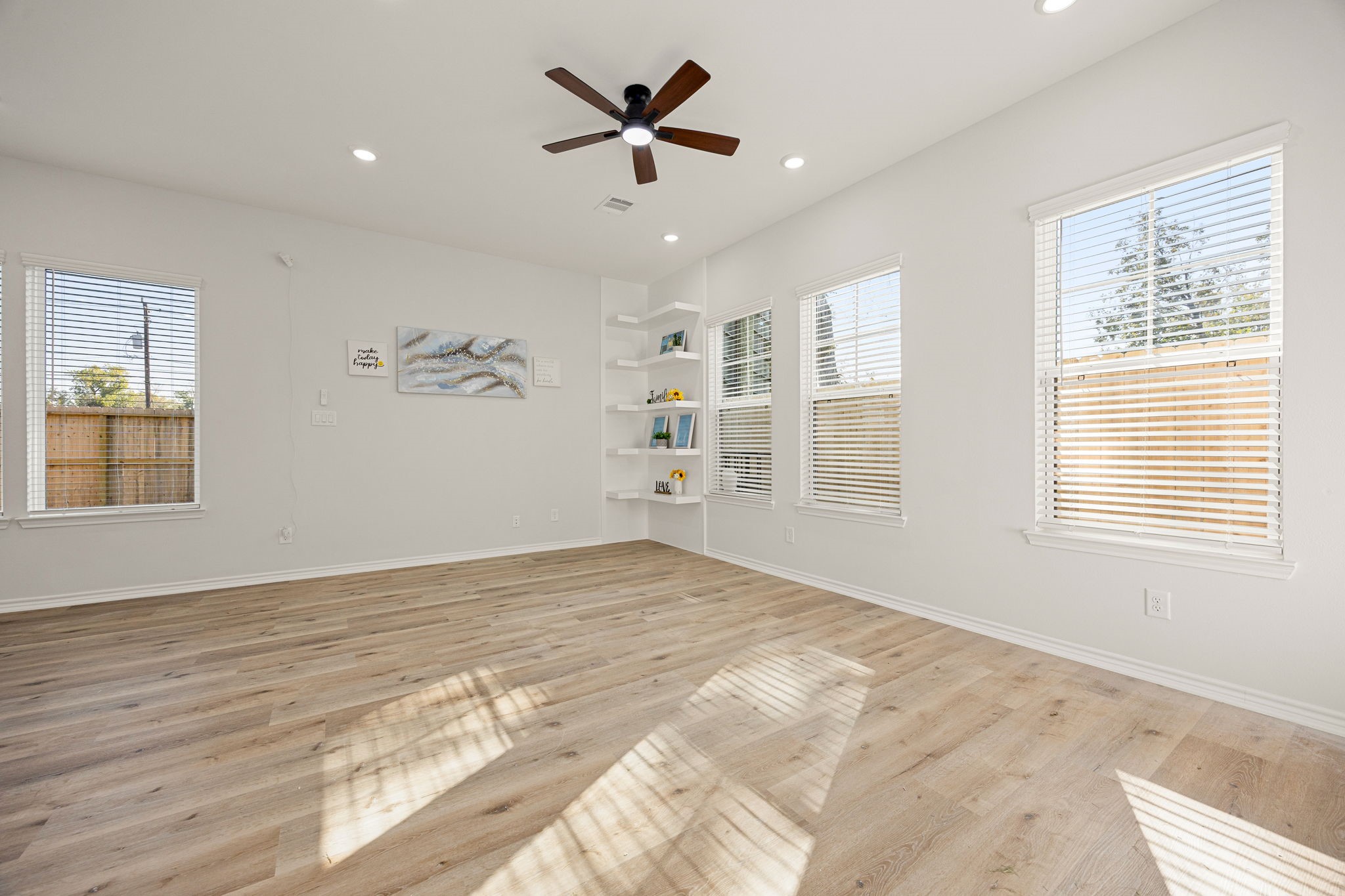 2720 Spence Street Houston, TX 77093 - Photo 10 of 50 a view of a livingroom with a ceiling fan and window