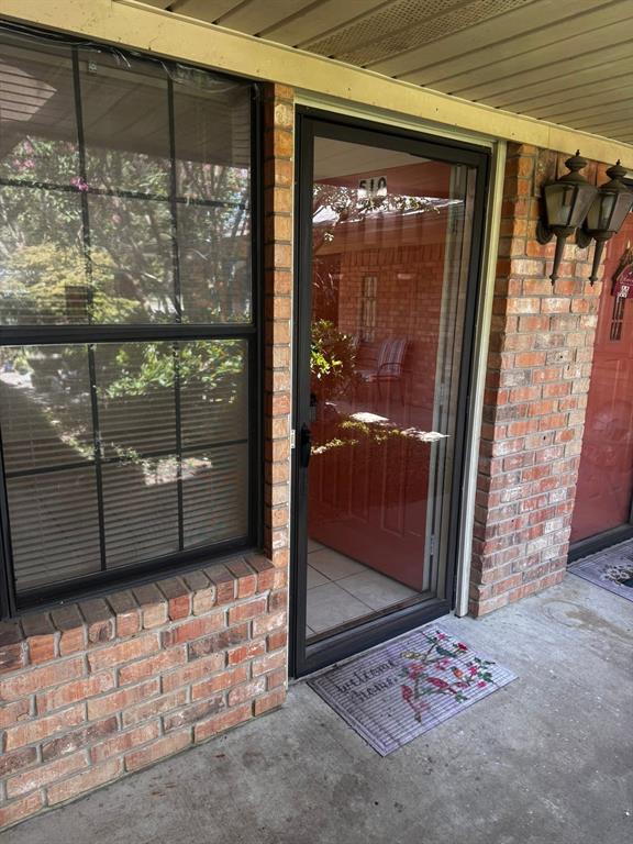 a window and a glass door in front of a glass door