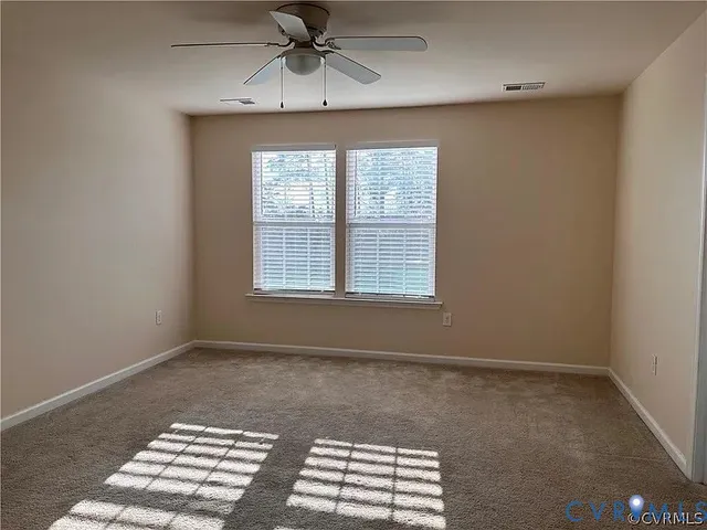 a view of a bedroom with a window