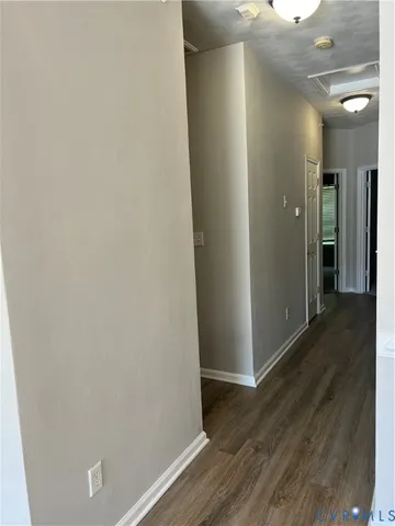 a front view of a building with many windows