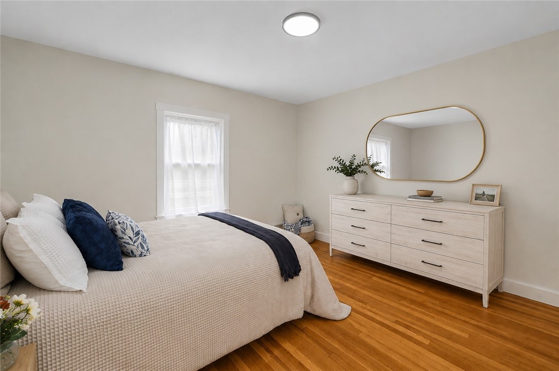 461 River Road Lincoln, RI 02865 - Photo 13 of 32 Main bedroom with hardwood flooring, LED lighting