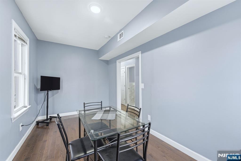 757 Thomas Street Elizabeth, NJ 07202 - Photo 11 of 38 a view of a livingroom with furniture and a window