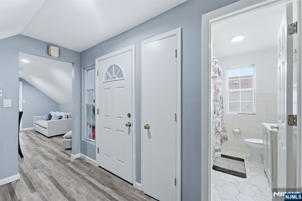 757 Thomas Street Elizabeth, NJ 07202 - Photo 20 of 38 a bathroom with a bathtub and shower