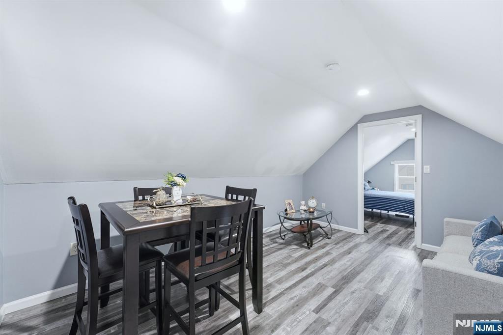 757 Thomas Street Elizabeth, NJ 07202 - Photo 21 of 38 a view of a dining room with furniture and a livingroom