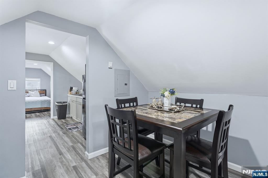 757 Thomas Street Elizabeth, NJ 07202 - Photo 22 of 38 a view of a dining room with furniture and wooden floor
