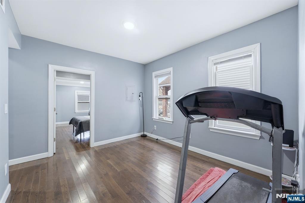 757 Thomas Street Elizabeth, NJ 07202 - Photo 4 of 38 a living room with furniture and a wooden floor