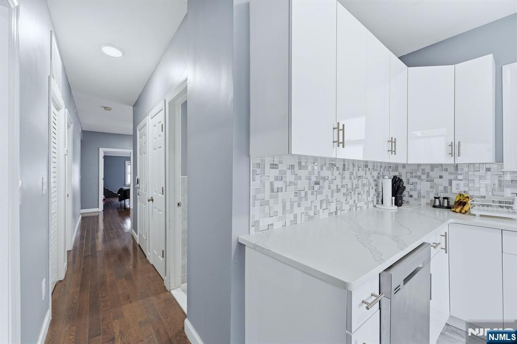 757 Thomas Street Elizabeth, NJ 07202 - Photo 5 of 38 a kitchen with a sink and cabinets