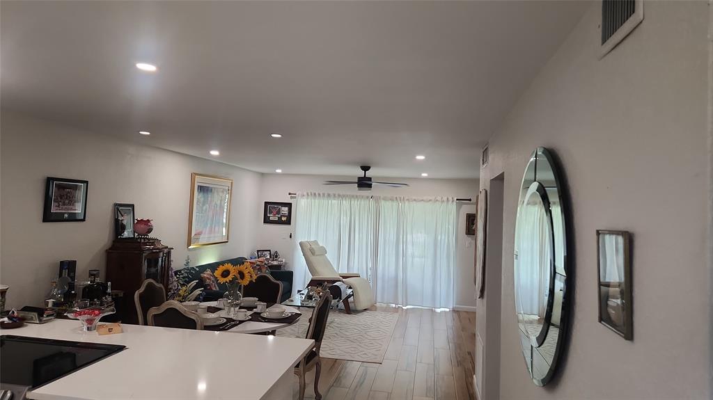 2202 Northeast 36th Street, Unit 15 Lighthouse Point, FL 33064 - Photo 2 of 47 a view of a room with gym equipment