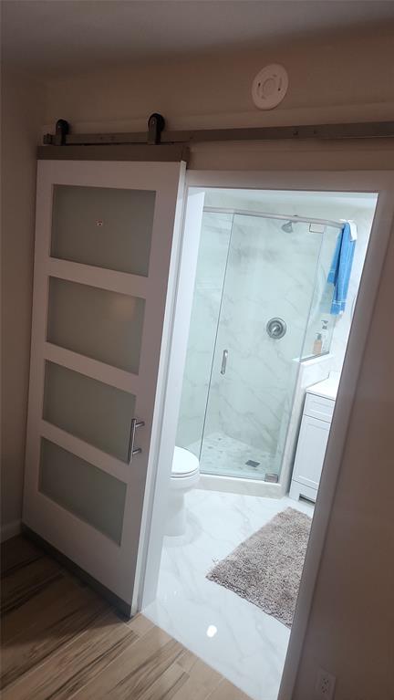 2202 Northeast 36th Street, Unit 15 Lighthouse Point, FL 33064 - Photo 27 of 47 a view of walk in closet