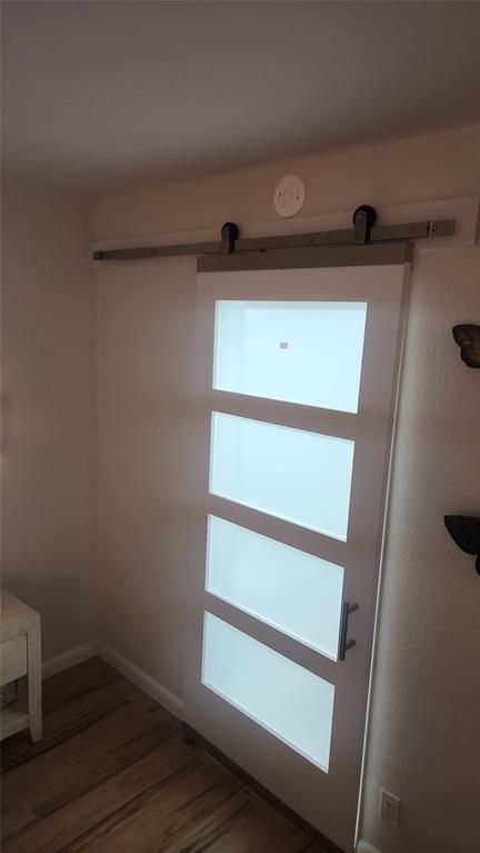 2202 Northeast 36th Street, Unit 15 Lighthouse Point, FL 33064 - Photo 28 of 47 a view of walk in closet with clothes and shoes