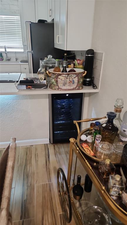 2202 Northeast 36th Street, Unit 15 Lighthouse Point, FL 33064 - Photo 8 of 47 a kitchen with a stove and a sink