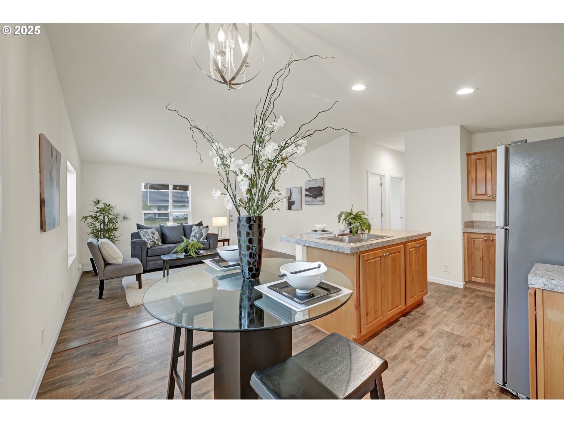 87886 Cedar Flat Road Springfield, OR 97478 - Photo 13 of 34 a living room with furniture a dining table and a potted plant